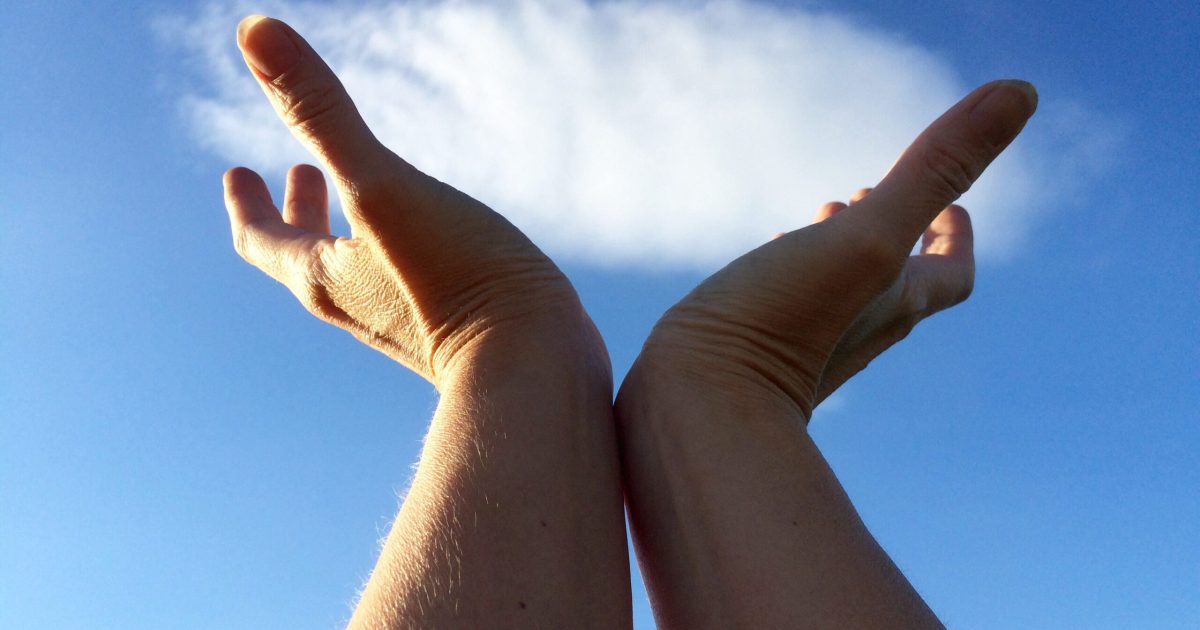 hands-holding-a-cloud-where-message-can-be-written-2023-11-27-04-57-14-utc