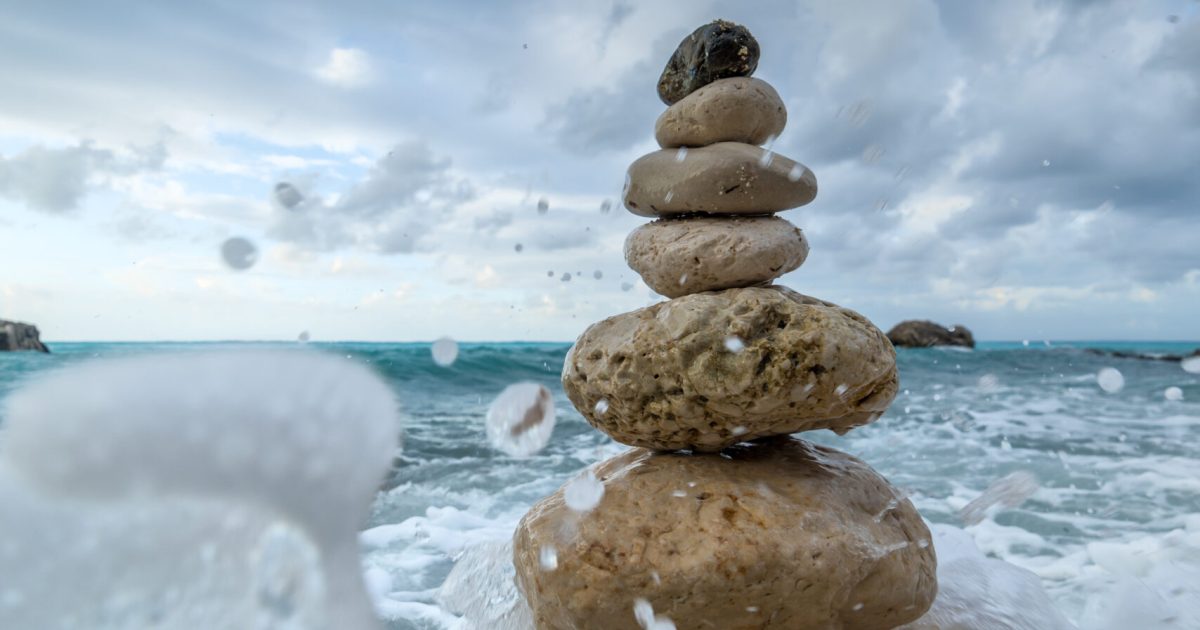 Stack of stones on the beach in Lefkada Greece